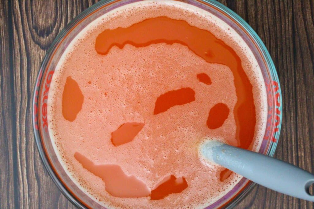 stir in blue moon beer vodka and orange juice to jello mixture
