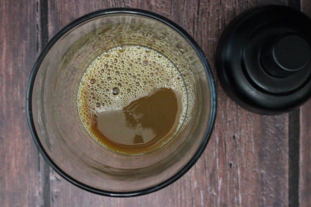 add vodka, kahlua, espresso, chai, and cream to cocktail shaker
