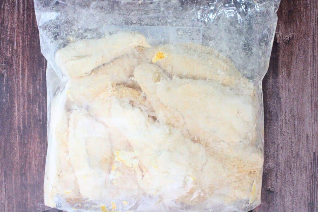 combine the wings and hooters wing breading in a zippered bag and toss until coated