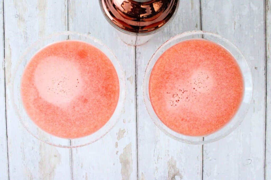 shake strawberry lemon drop until chilled and strain into prepared glasses
