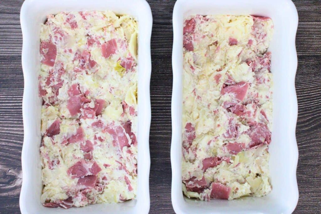 spread reuben dip mixture in baking dishes