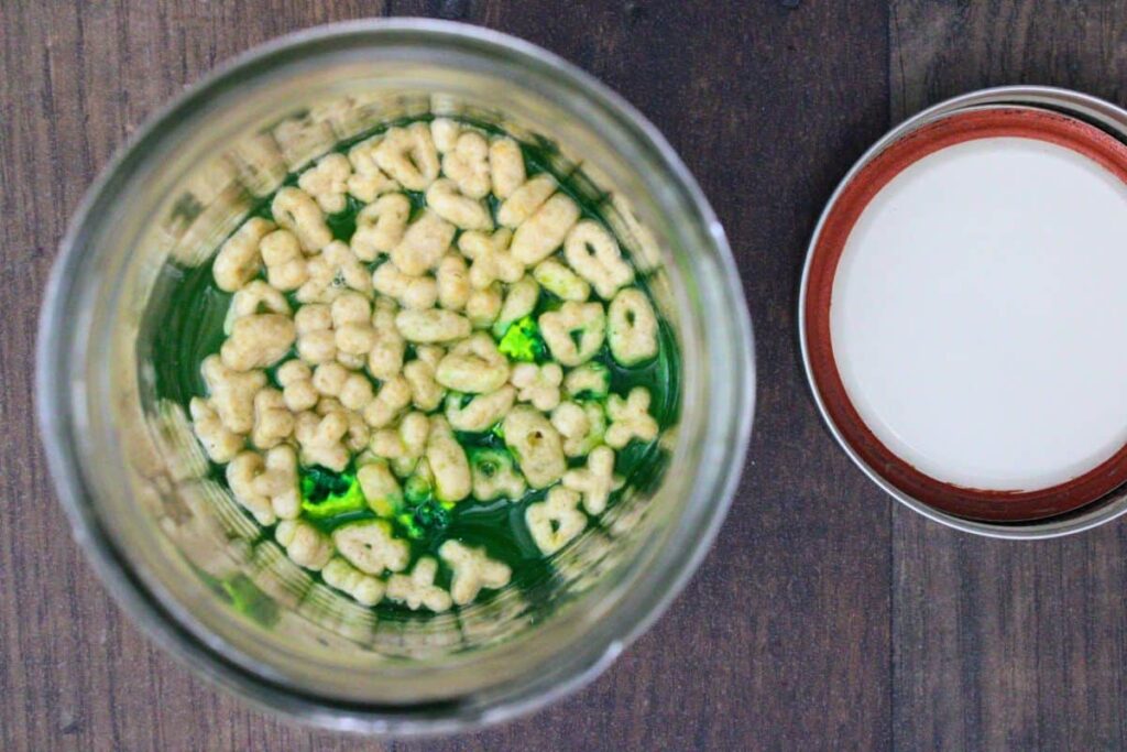 add vodka and cereal to a jar to steep