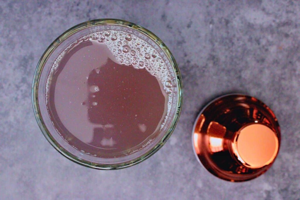 add vodka, lemon juice, triple sec, and lavender syrup to cocktail shaker