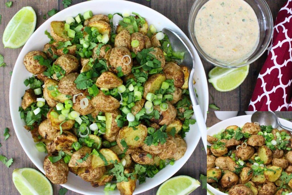 overhead view of gunpowder potatoes with cilantro and green onions in a white bowl on a wooden table surrounded by cut limes
