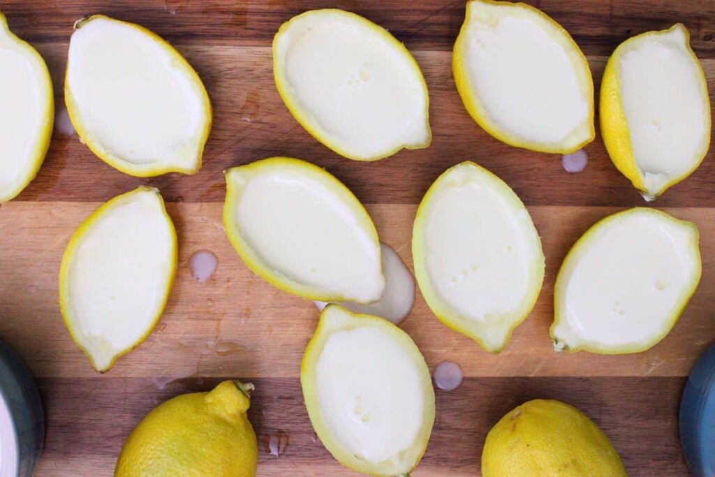 pour cream mixture into hollowed out lemon skins