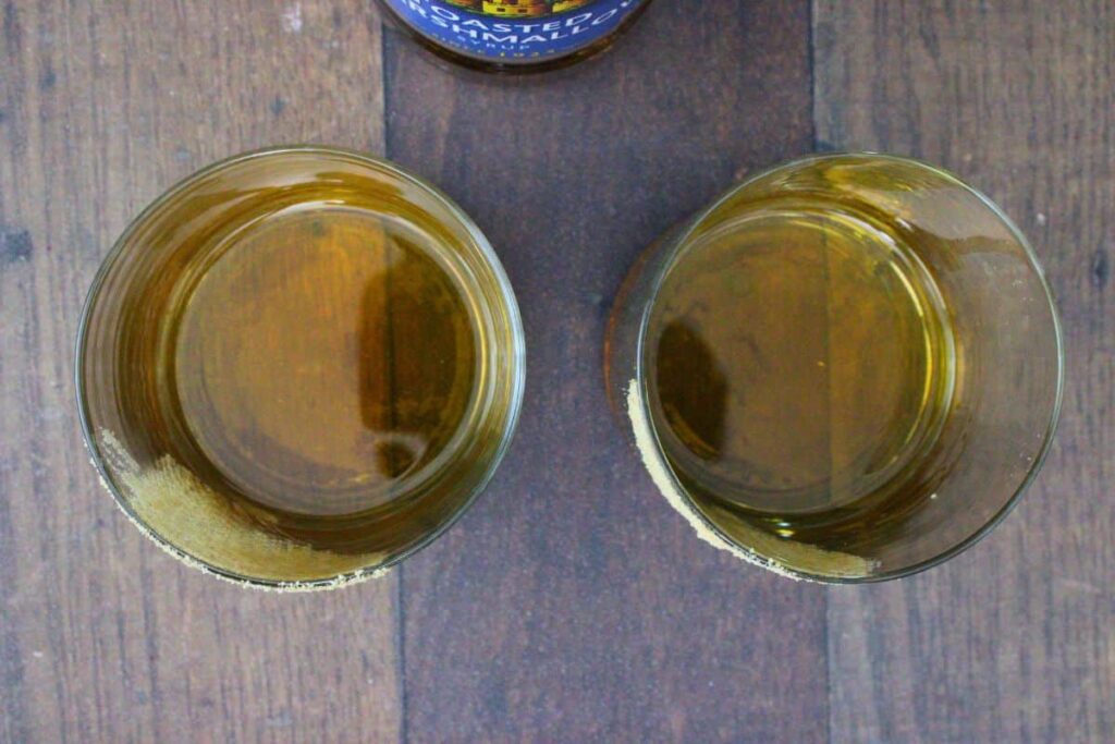 add bourbon and marshmallow syrup to glass and stir