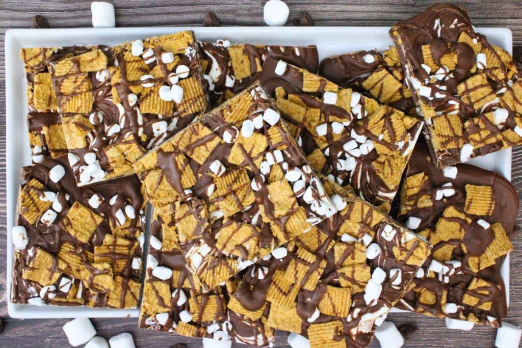 overhead view of smores bark with golden grahams mini marshmallows and chocolate