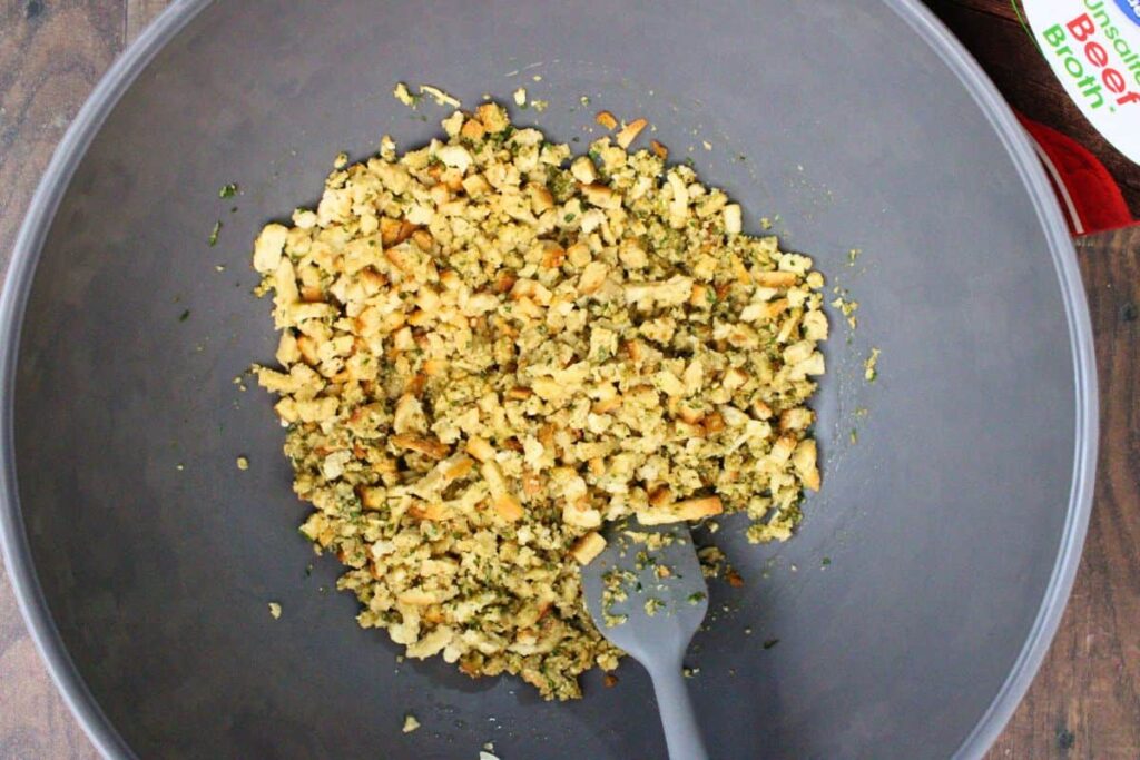 put stove top stuffing mix and beef broth in a large bowl