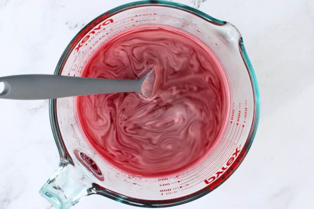 add red jello to boiling water and then stir in berry vodka