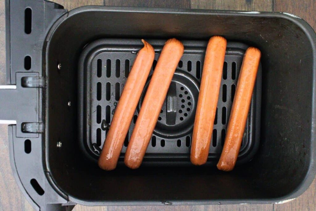 place hot dogs in air fryer basket