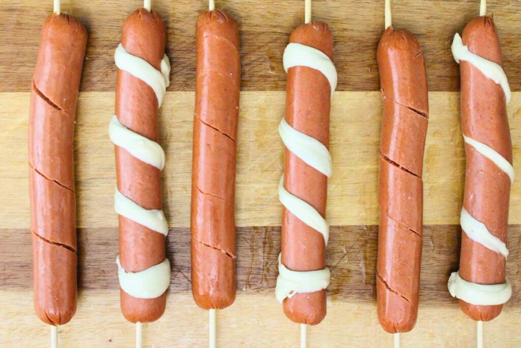 optionally add crescent dough in the center of the spiral hot dog cuts