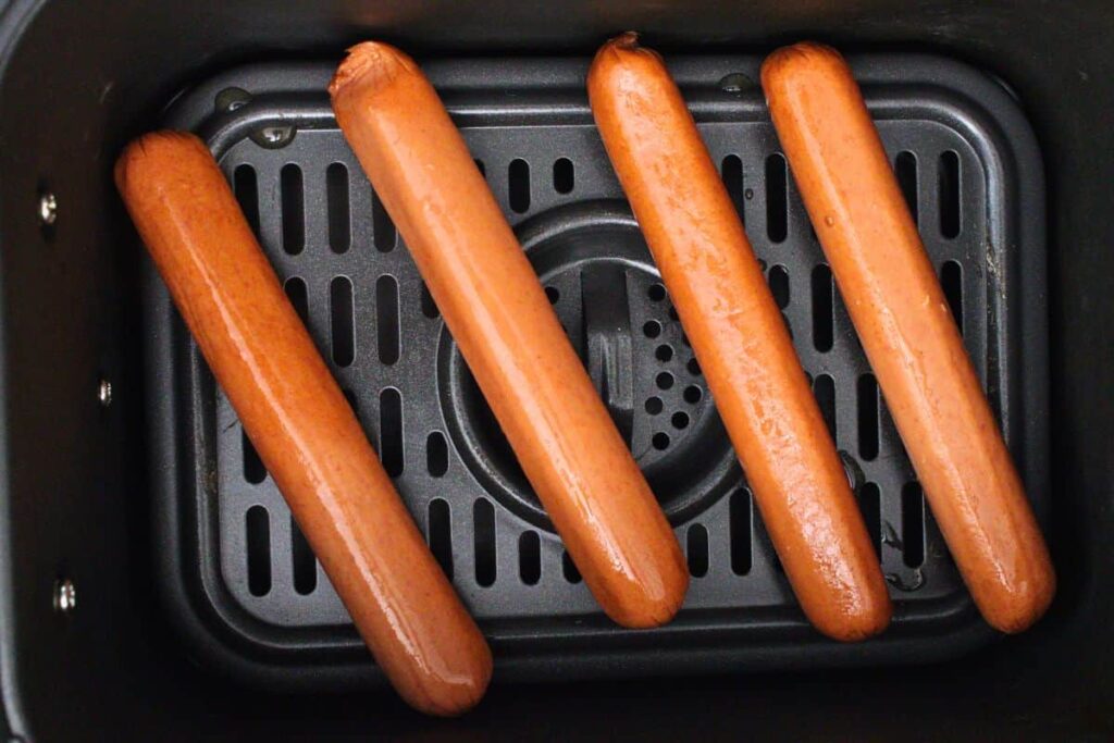 place hot dogs in air fryer basket or rack