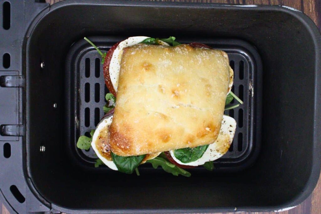 place caprese sandwich in air fryer basket