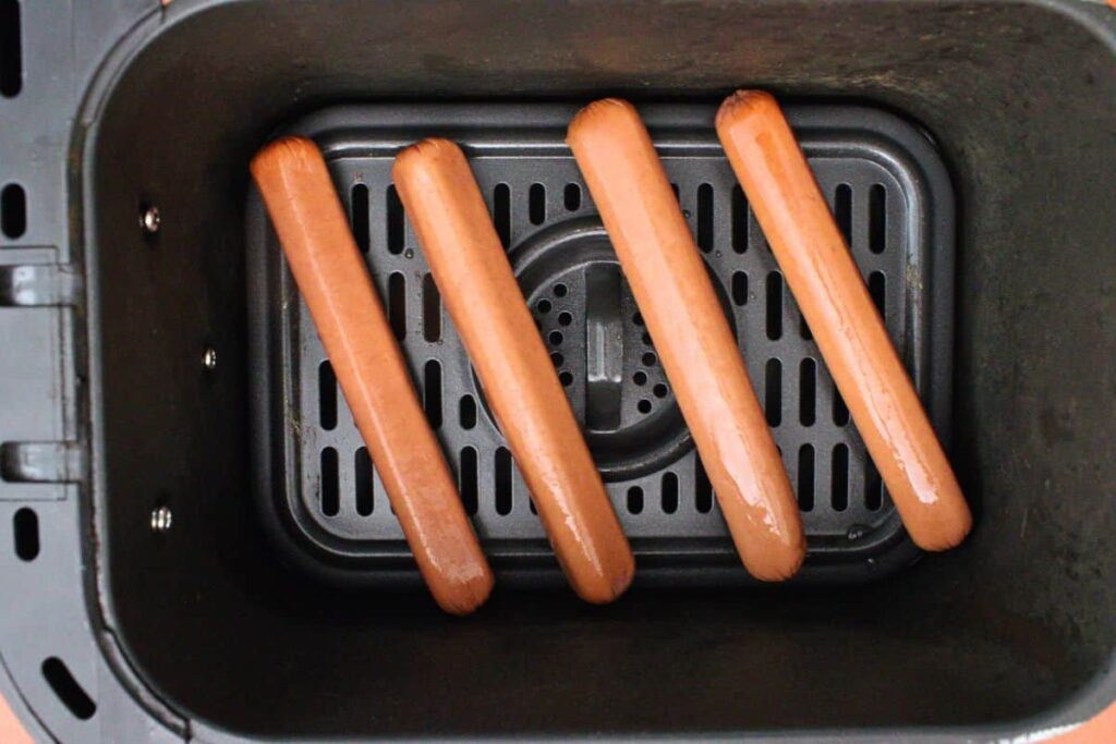 place taco hot dogs in air fryer basket