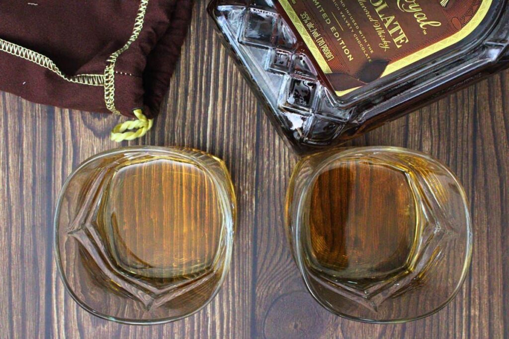 add crown royal chocolate whiskey to old fashioned glass
