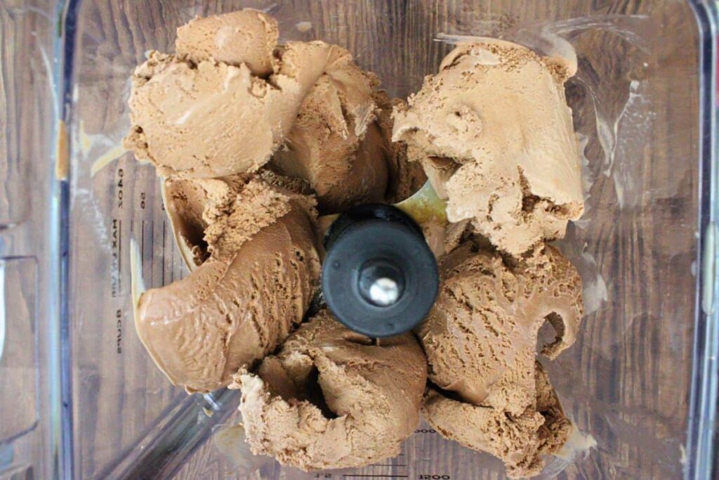 add ice cream, whiskey, baileys, and kahlua to blender