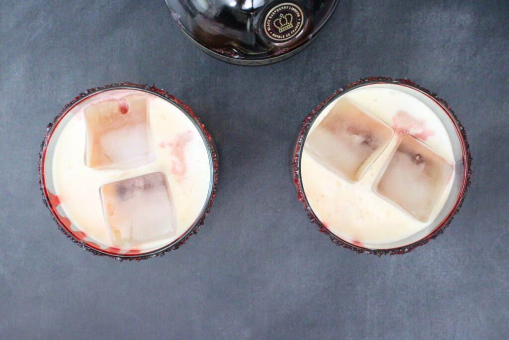 pour chambord to complete bloody tequila sunset effect