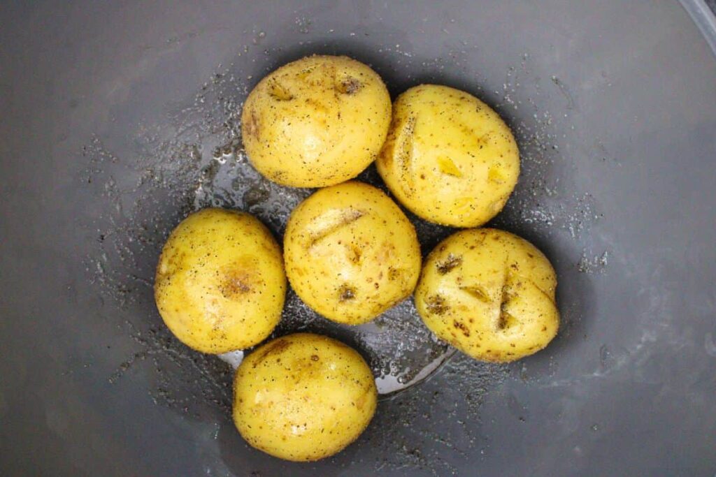toss halloween potatoes in olive oil, salt, and pepper