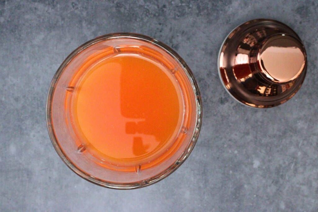 add blood orange margarita ingredients to cocktail shaker