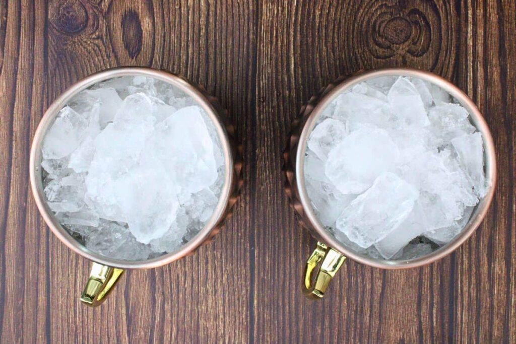 fill chocolate mule copper mug with crushed ice