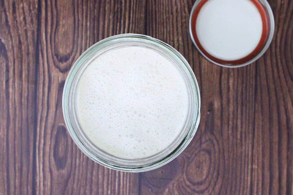 pour chocolate coquito into airtight container and refrigerate