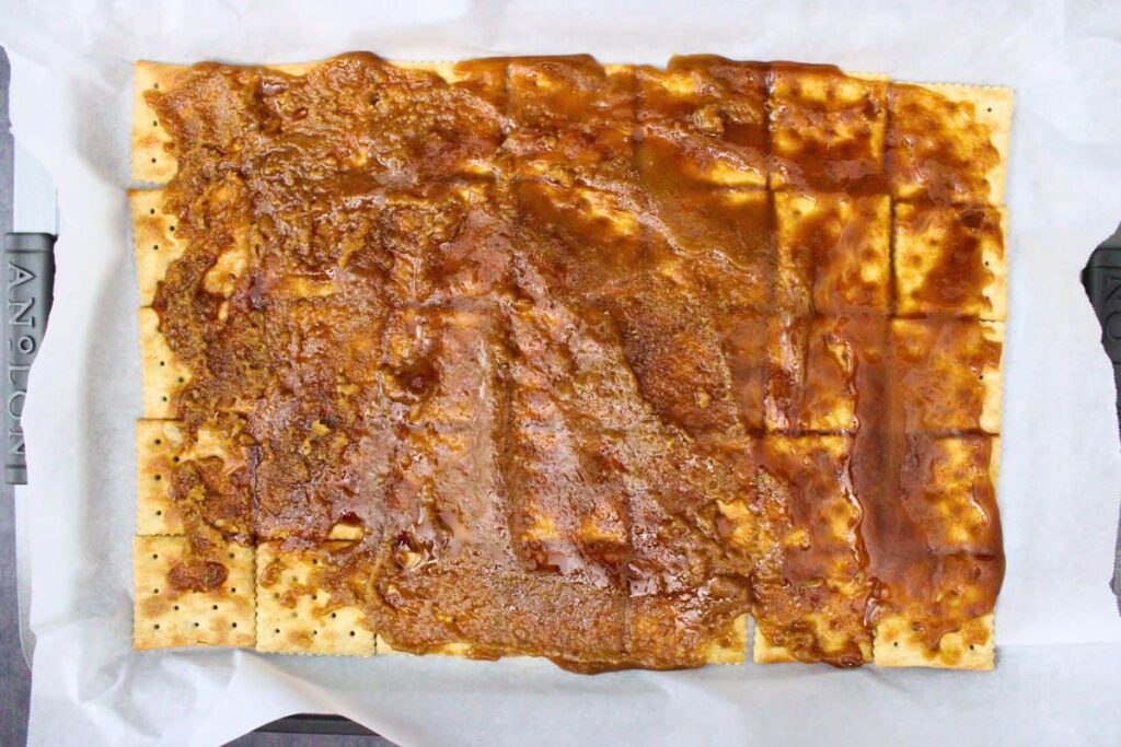 pour hot sugar mixture over saltines