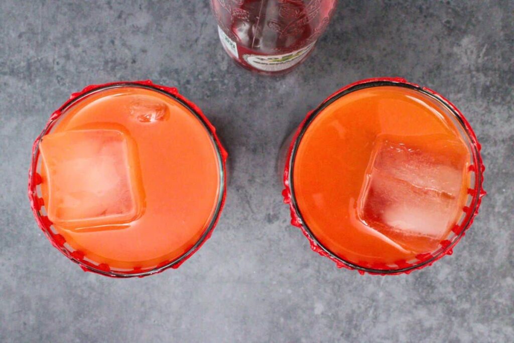 slowly pour grenadine into vampire tequila sunrise