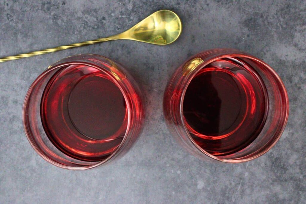 add cranberry juice and vodka to lowball style glass