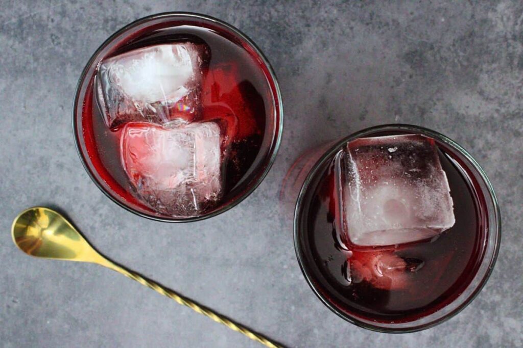add vodka and cranberry juice to ice and gently stir