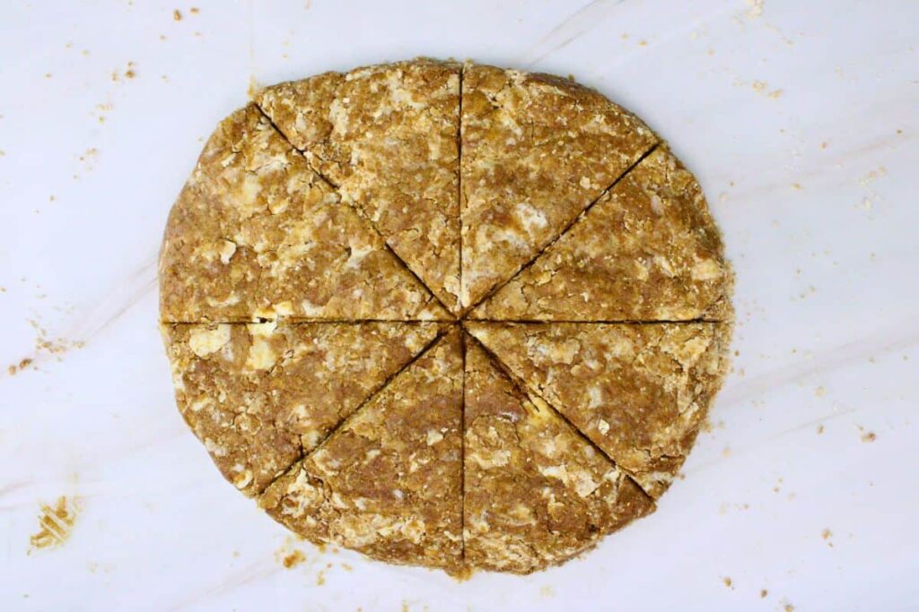 pat gingerbread scones dough into a disc and cut into even wedges
