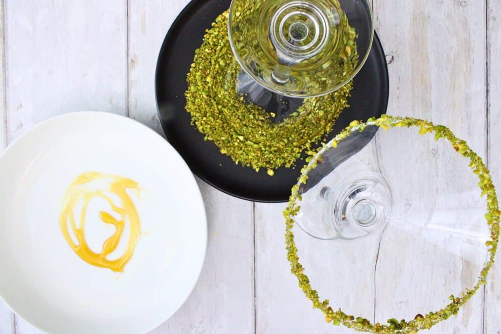 rim martini glass with crushed pistachios