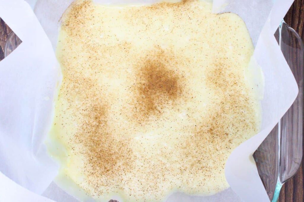 stir in rum extract and nutmeg them pour into prepared pan