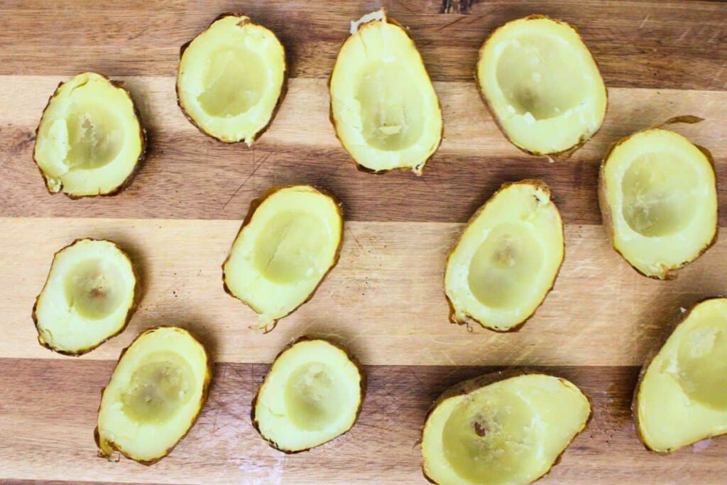 slice cooled potatoes in half and scoop out the center