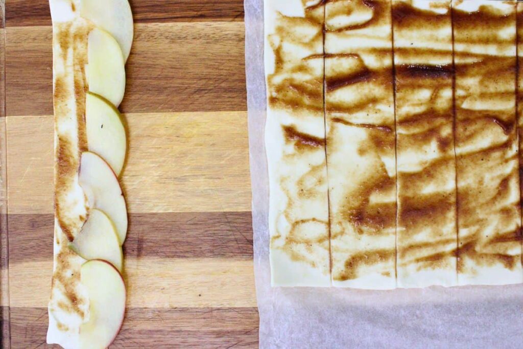 spread apple butter across dough strips and place apple slices