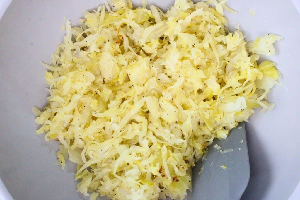 combine sauerkraut and seasonings in a mixing bowl