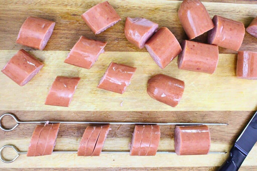 slice kielbasa into pieces and use chopsticks to add hasselback slices