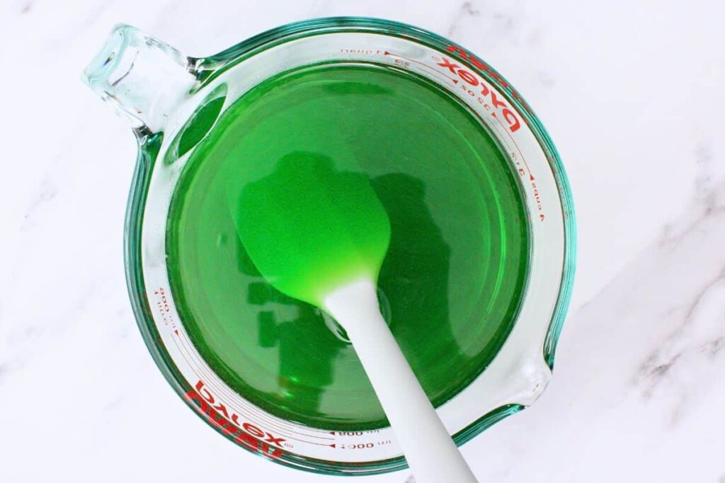 stir in whiskey butterscotch schnapps and remaining water to green jello mix