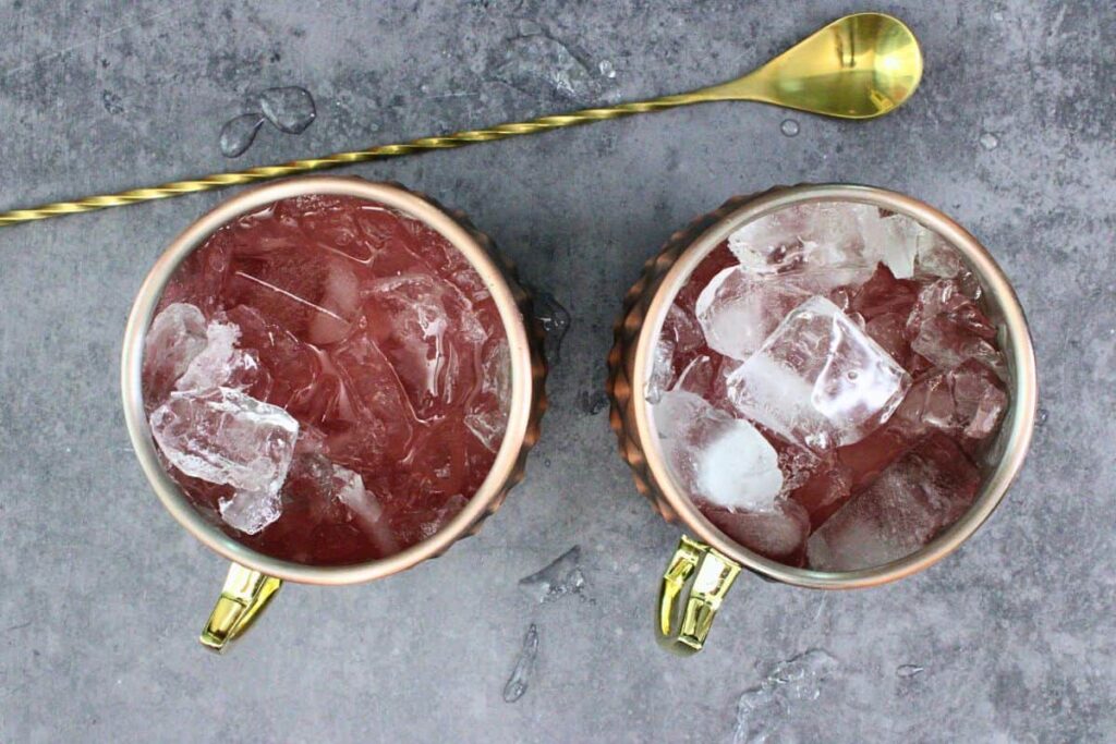 add watermelon vodka, watermelon juice, and lime juice to mule mug