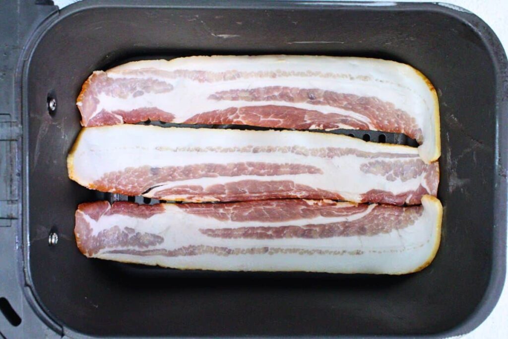 lay bacon flat in air fryer basket
