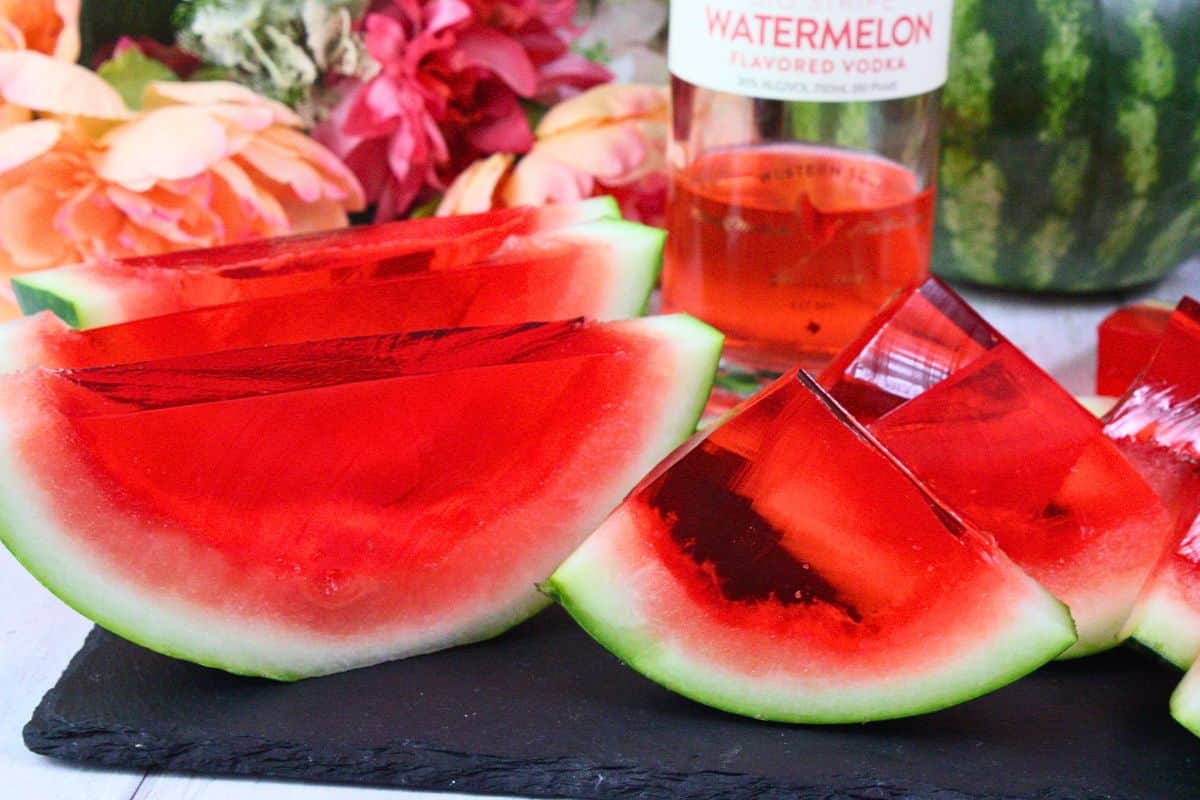 watermelon jello shot slices and wedges fit into a fresh watermelon rind