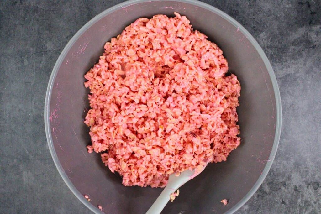 add pink food coloring and fold in rice krispies for brain color