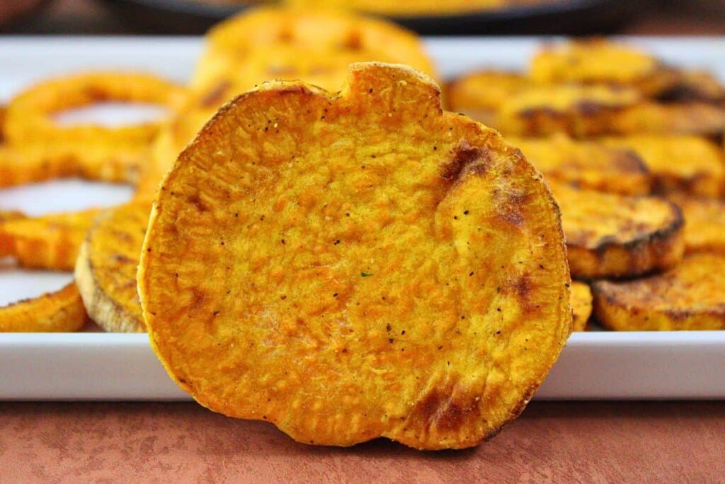 closeup view of air fryer roasted pumpkin sweet potato standing up