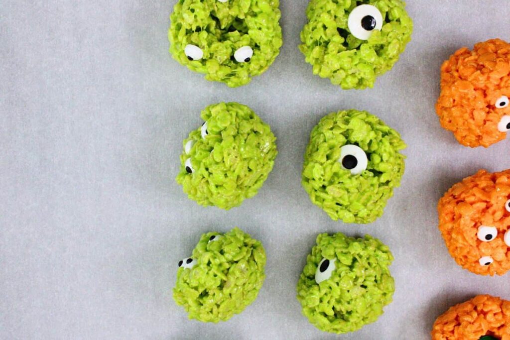 form green rice krispie treat balls and add candy eyes
