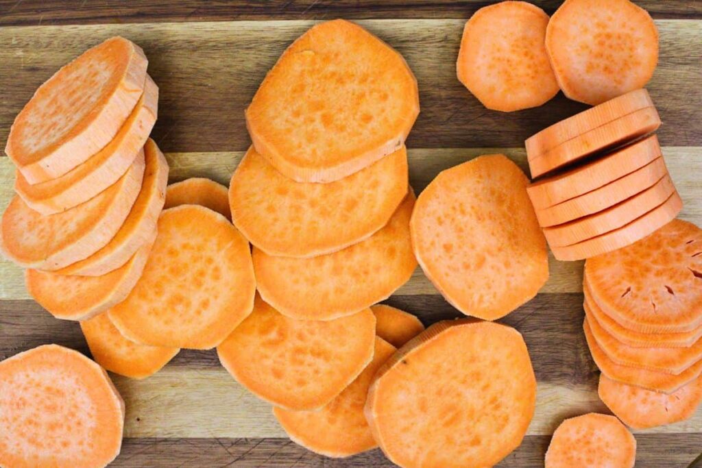 slice pumpkin sweet potatoes into quarter inch slices