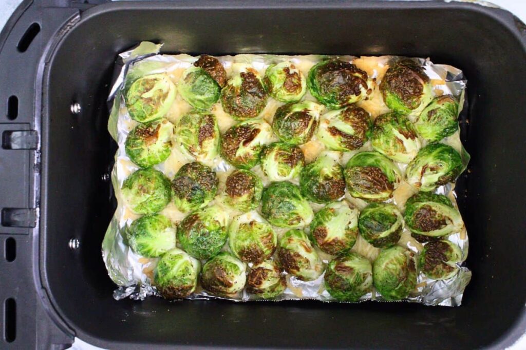 air fryer brussel sprouts until the parmesan cheese and sprouts are browned to your liking