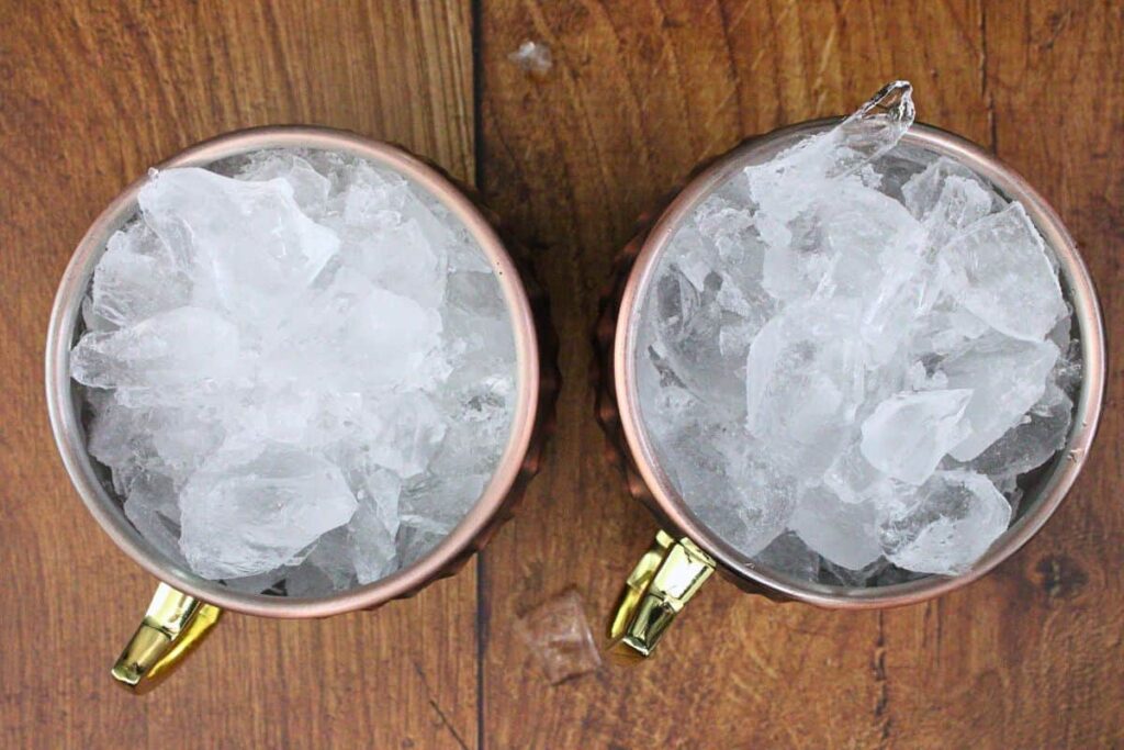 fill crown apple mule copper mug with crushed ice