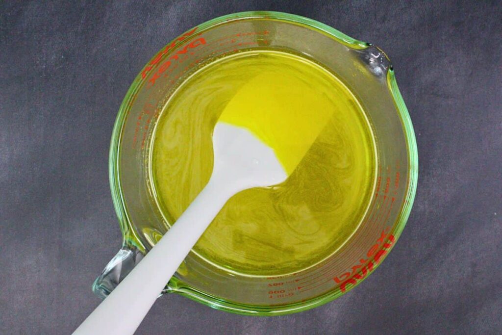 fully dissolve lemon gelatin in hot water and stir in vanilla vodka