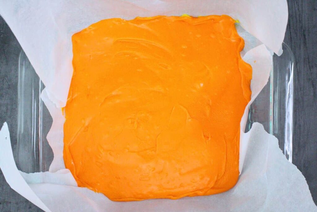 layer orange fudge mixture on top of yellow