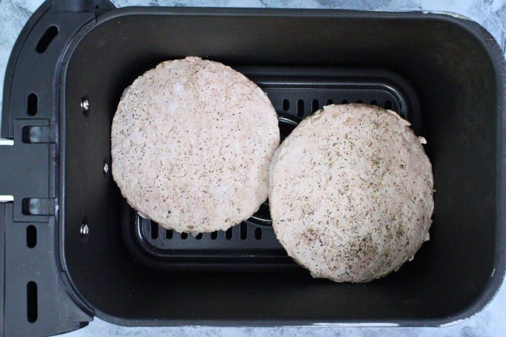 place trader joes frozen turkey burgers in air fryer basket