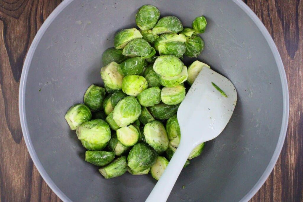 toss halved brussel sprouts with melted butter, salt, and pepper